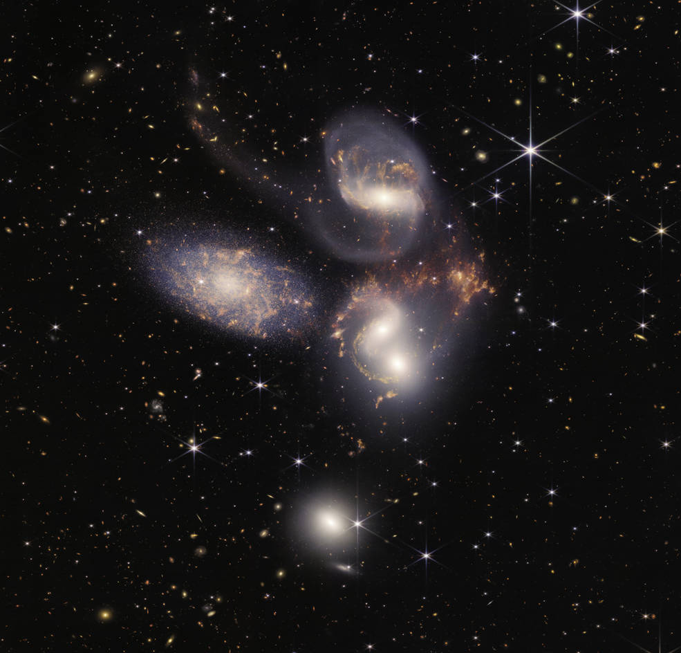 Stephan’s Quintet, a visual grouping of five galaxies, is best known for being prominently featured in the holiday classic film, “It’s a Wonderful Life.” Today, NASA’s James Webb Space Telescope reveals Stephan’s Quintet in a new light. 