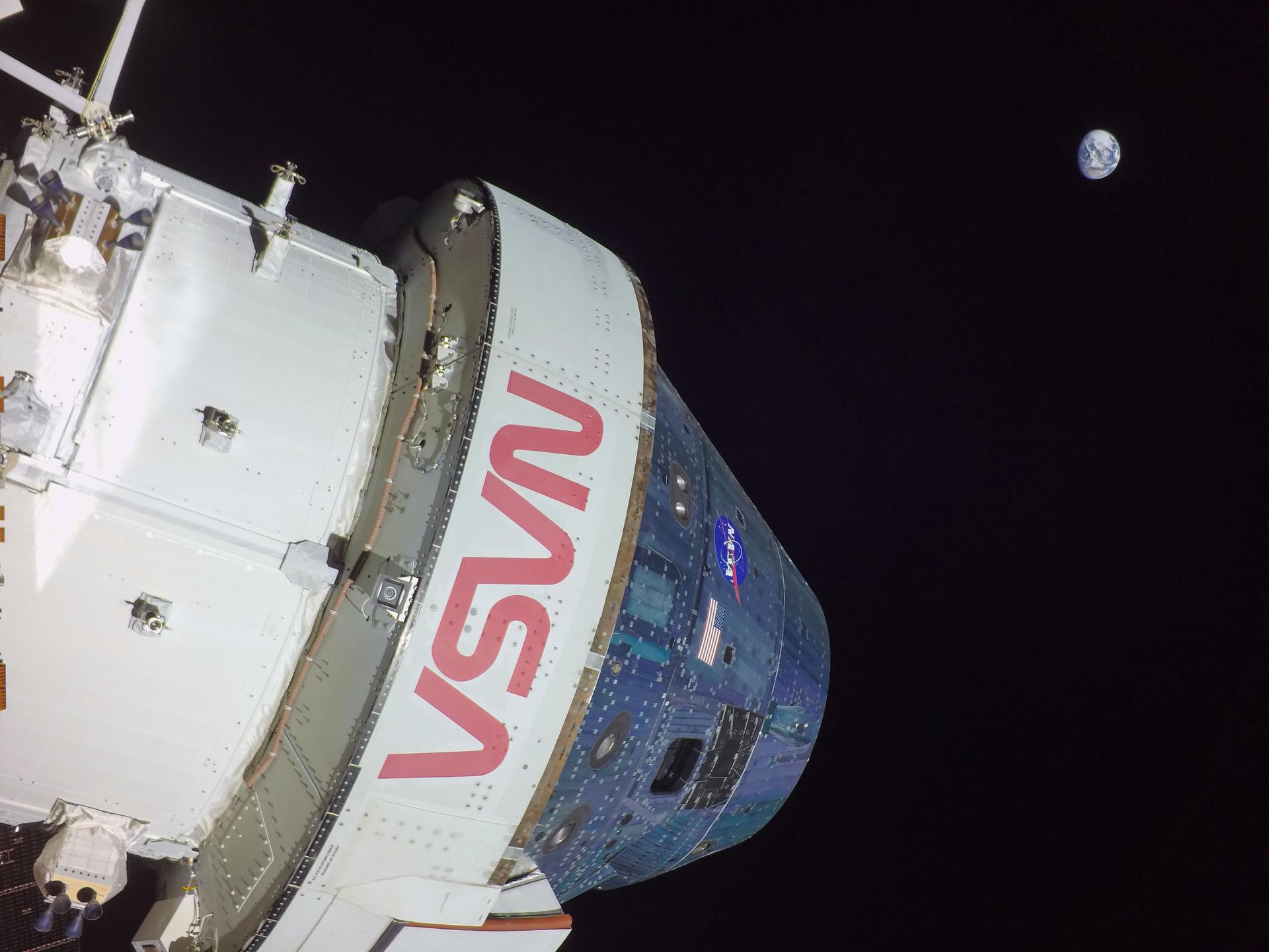 On flight day 11, NASA’S Orion spacecraft captured imagery looking back at the Earth from a camera mounted on one of its solar arrays. The spacecraft is currently in a distant retrograde orbit around the Moon.